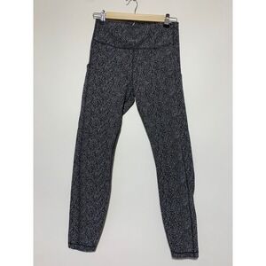 Athleta Women Size M Black Graphic Ultimate Stash Textured 7/8 Tight Leggings